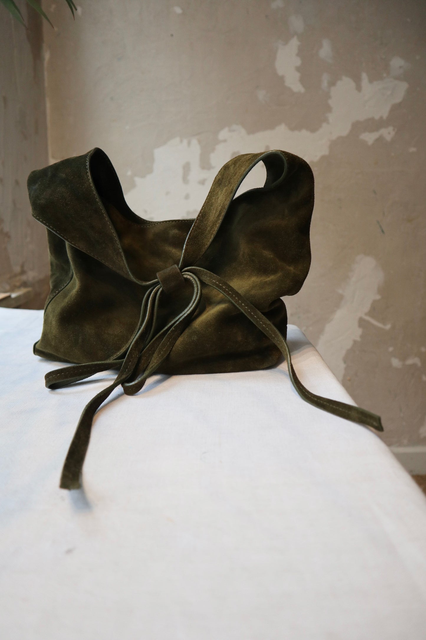 suede Reformation Bag