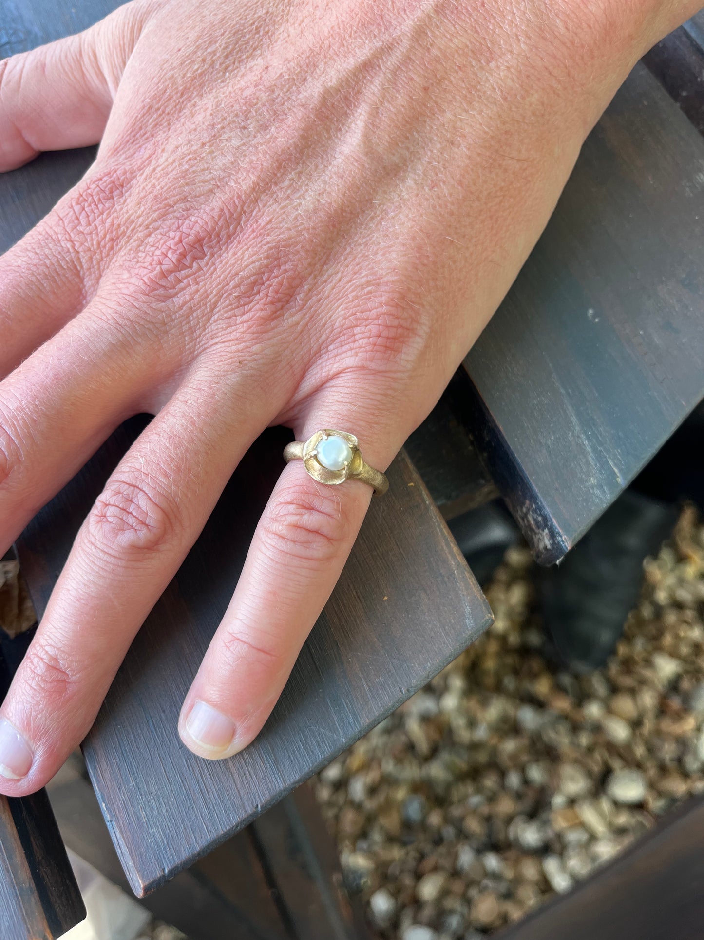 Natural Pearl On Bronze cast band.