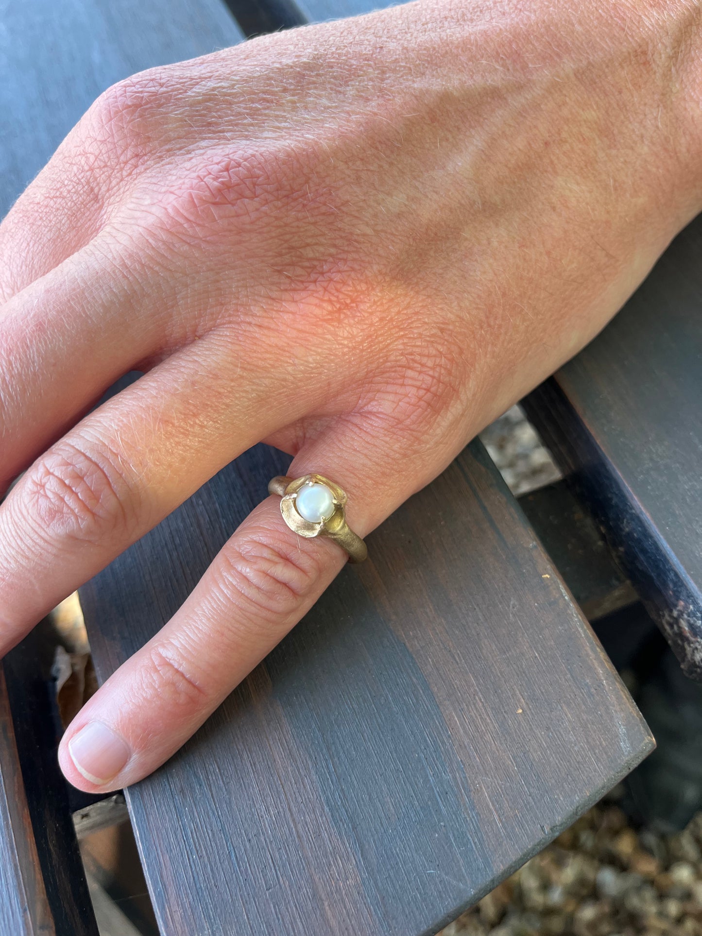 Natural Pearl On Bronze cast band.