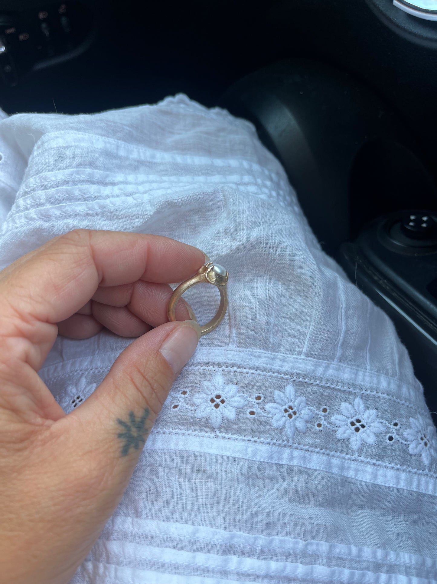 Natural Pearl On Bronze cast band.